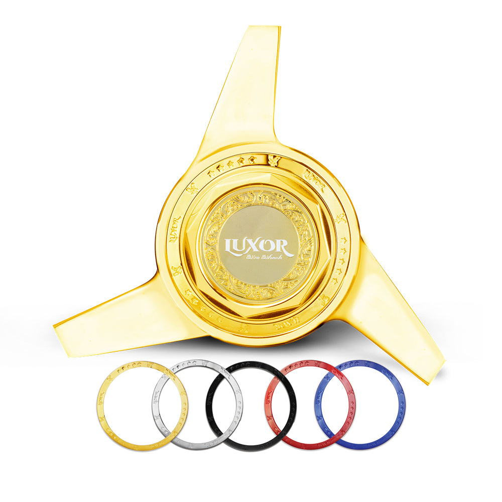 https://luxorwirewheels.com/cdn/shop/products/Luxor_3-Bar_SuperSwap_Knock-Off_Gold_all-rings.jpg?v=1616797130